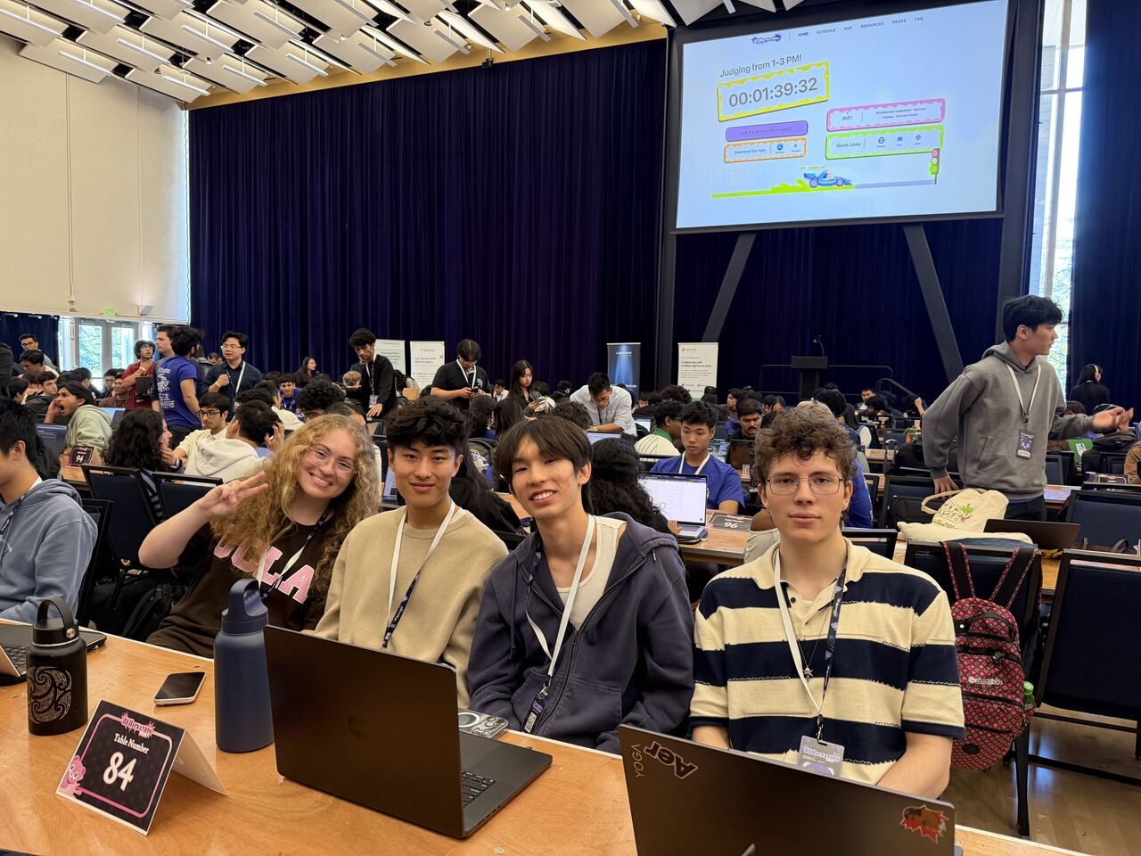 Jennifer and teammates at table 84 during judging