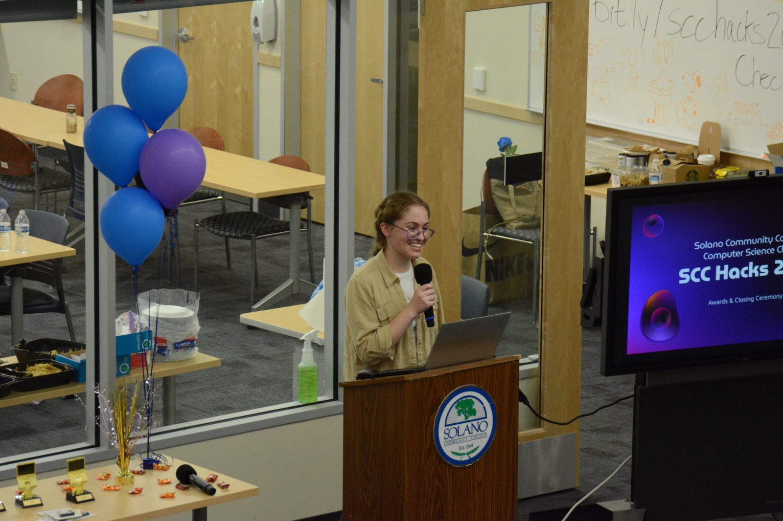 Jennifer speaking at the SCC Hacks 2025 awards and closing ceremony